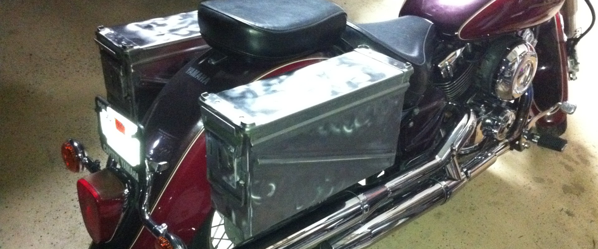 Can i ship my motorcycle with ammunition in the same shipment?