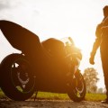 Are there any restrictions on what type of carriers can be used for international shipments of motorcycles?